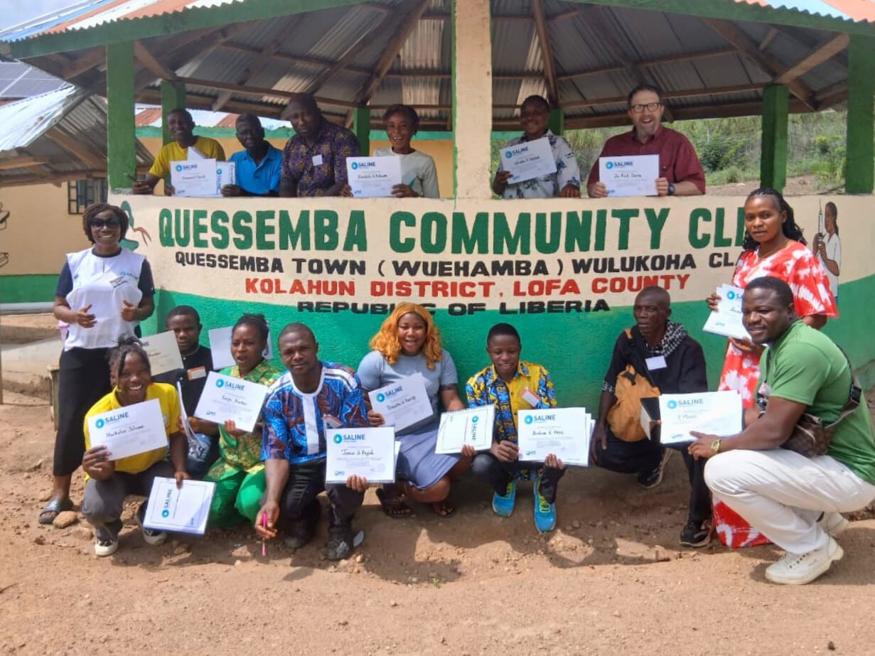 Participants in Liberia celebrating training completion